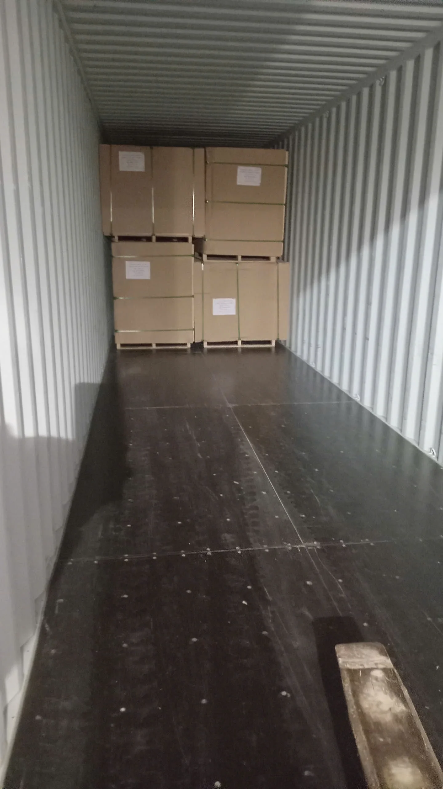 Loading plywood boards into 40HC container at Vietnam factory for export