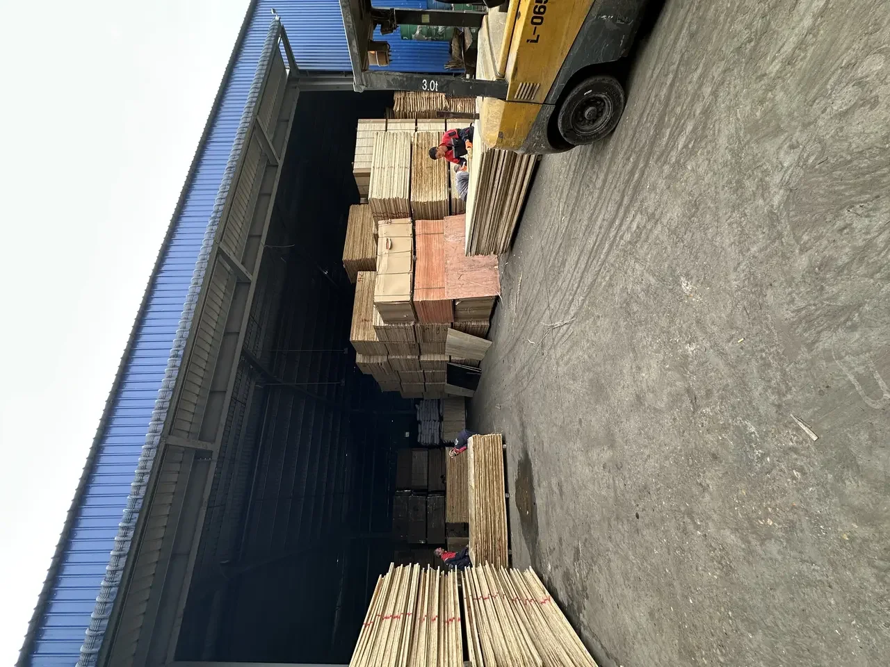 Plywood sheet manufacturing at Vietnam factory showing dedicated production facilities