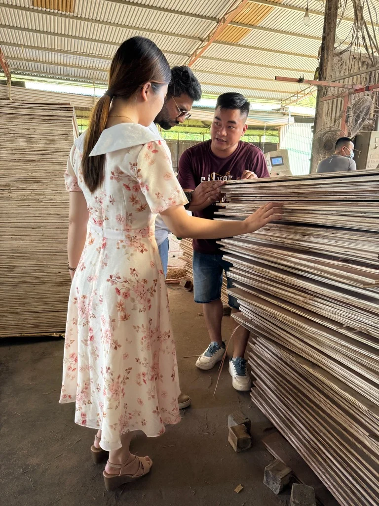HCPLY - Vietnam Plywood team inspecting plywood with international buyer at factory