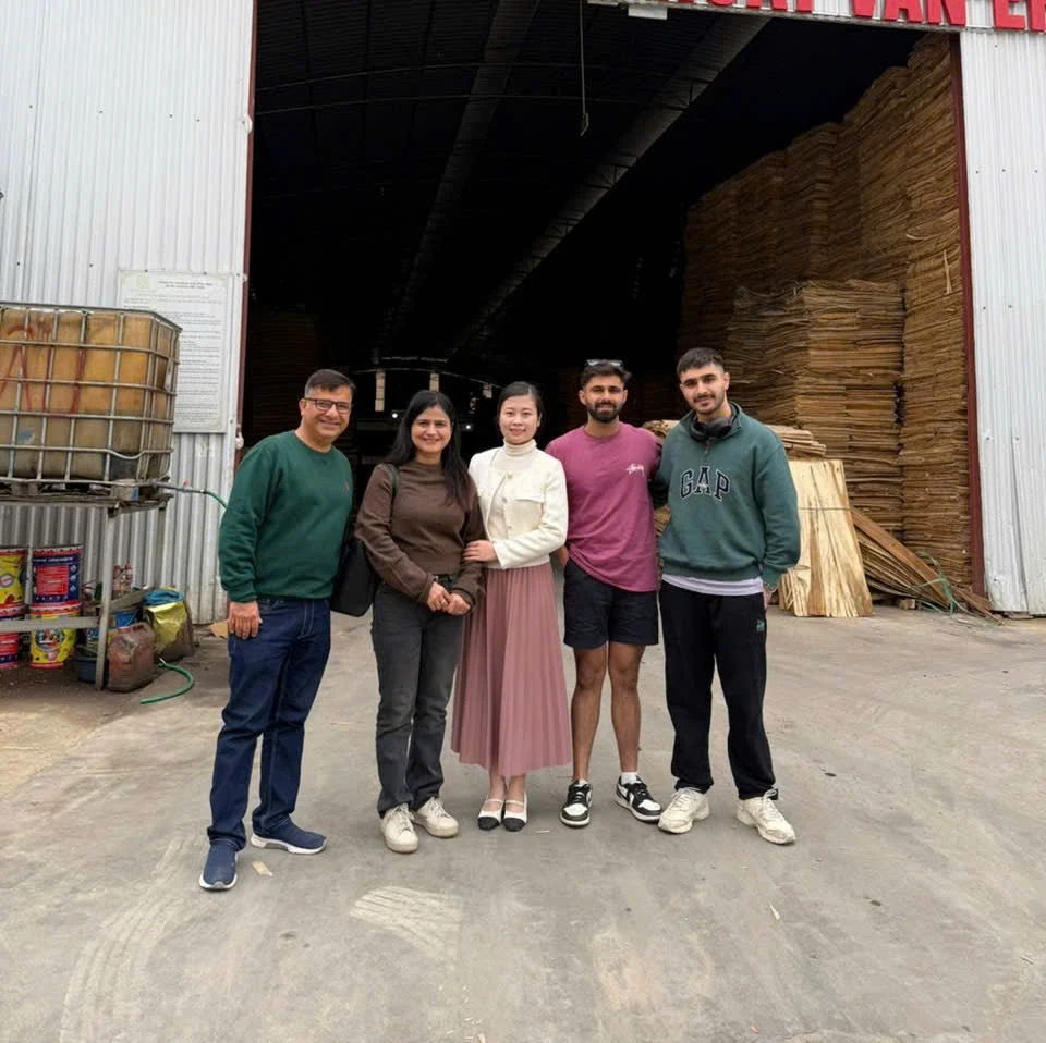 International buyers visiting HCPLY Vietnam plywood factory — market-specific product discussion and QC review