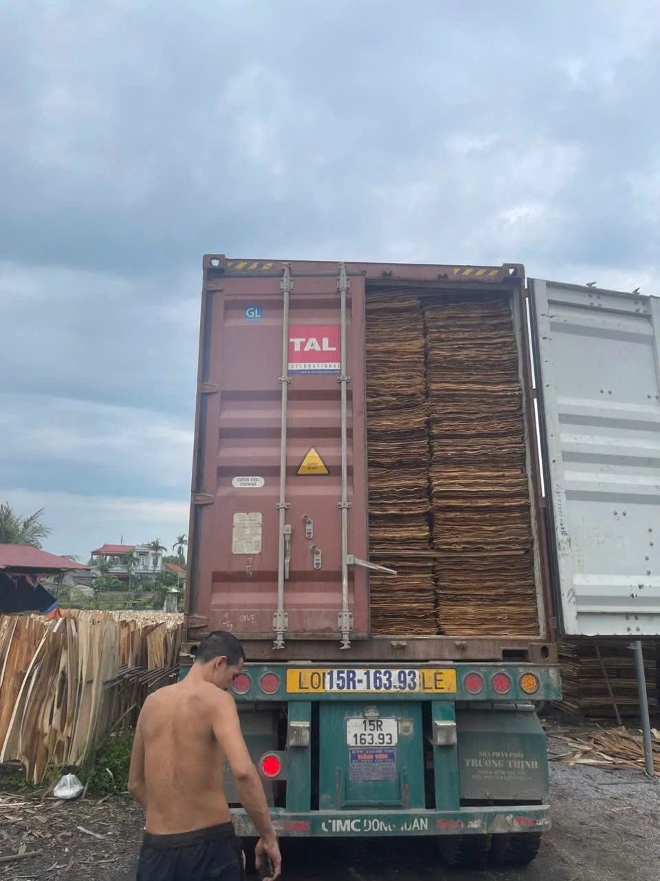 Vietnam plywood factory loading containers for export to global markets