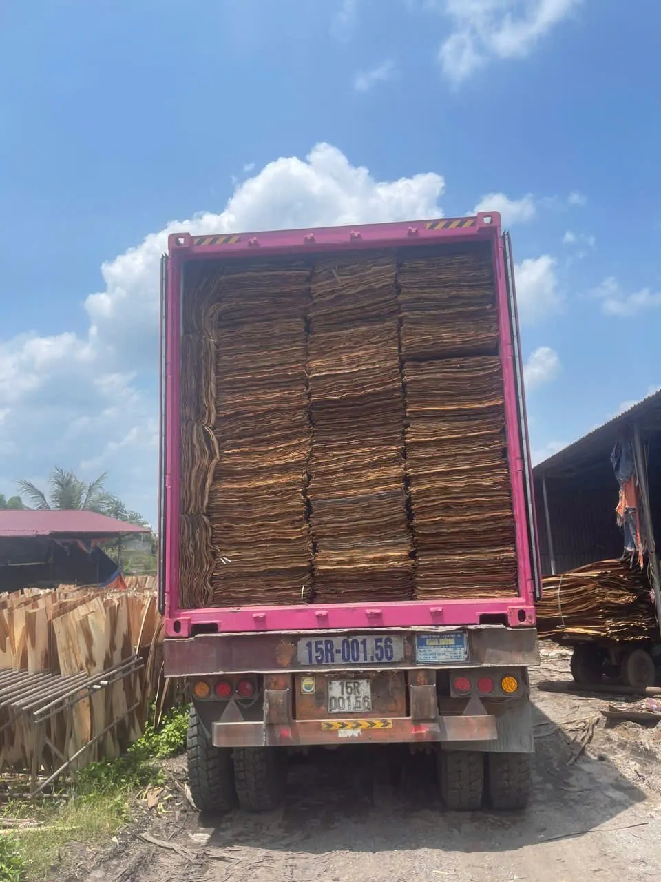 Loading plywood boards into 40HC container at HCPLY Vietnam factory for export
