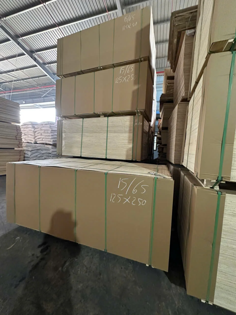 HCPLY plywood pallets strapped and ready for container loading — packing overview Vietnam