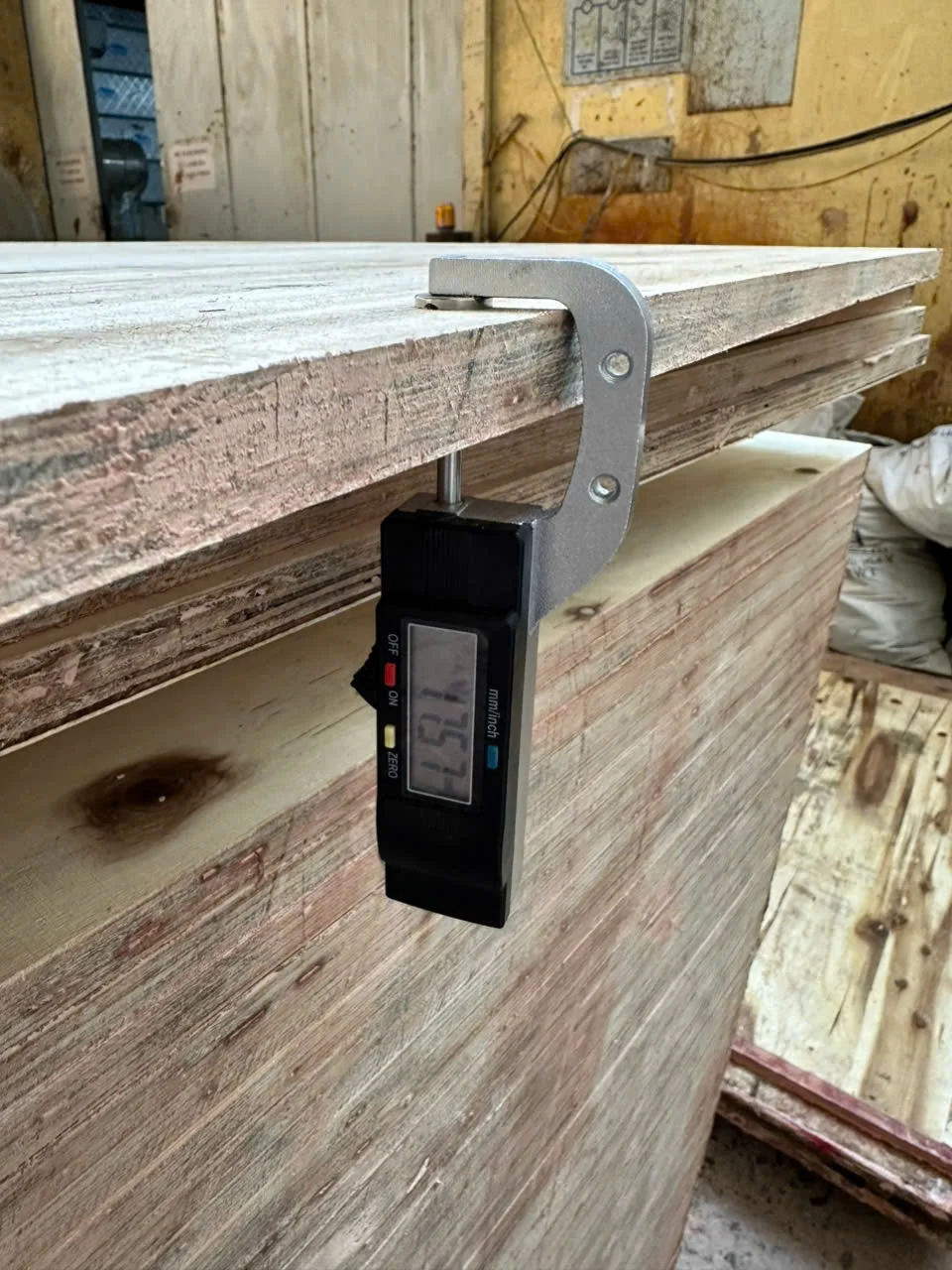 HCPLY plywood quality control inspection — sanding line calibration maintains thickness tolerance before container loading