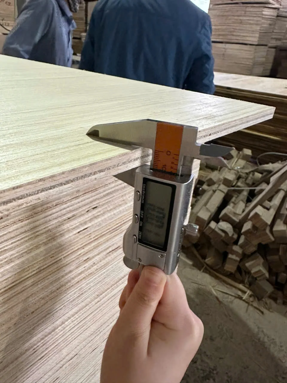 HCPLY plywood quality control thickness inspection 15mm panel Vietnam calibrated manufacturing